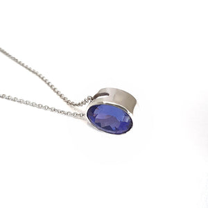 Luxuriously Suspended Slim Bezel Oval Tanzanite Pendant