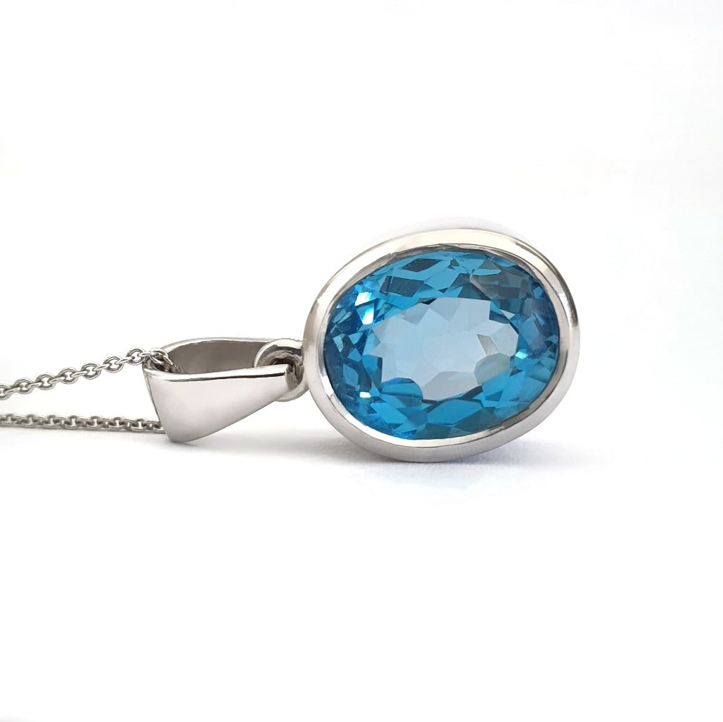 Majestic Handcrafted Blue Topaz Pendant and Chain