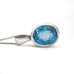 Majestic Handcrafted Blue Topaz Pendant and Chain