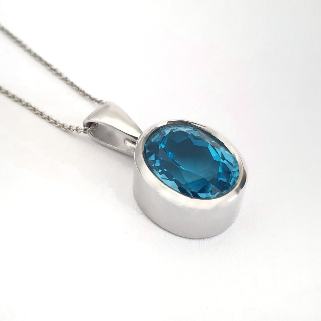 Majestic Handcrafted Blue Topaz Pendant and Chain