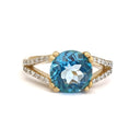 Majestic Round Cut Blue Topaz and Diamond Split Shank Ring