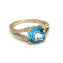 Majestic Round Cut Blue Topaz and Diamond Split Shank Ring
