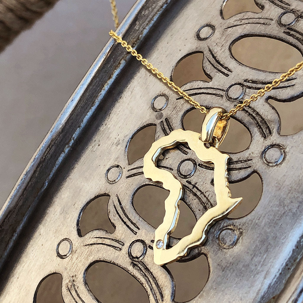 Petite Map of Africa Outline Pendant with Swiss Set Diamond