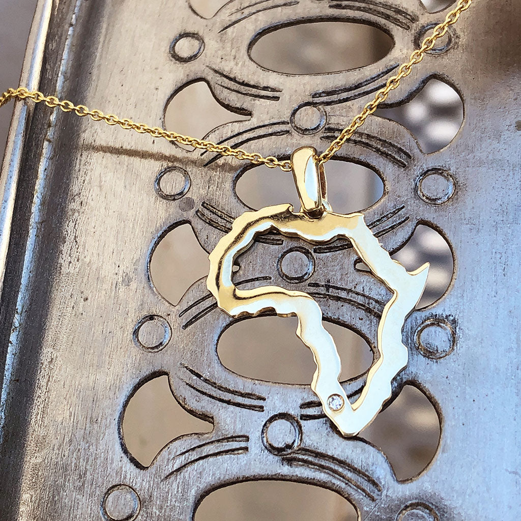 Petite Map of Africa Outline Pendant with Swiss Set Diamond