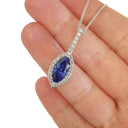 Marquise-Cut Tanzanite, Diamond Halo and Pavé Bale Pendant
