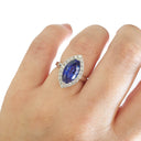 Marquise Cut Tanzanite and Diamond Halo Ring