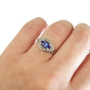 Marquise Cut tanzanite and Diamond Halo Ring