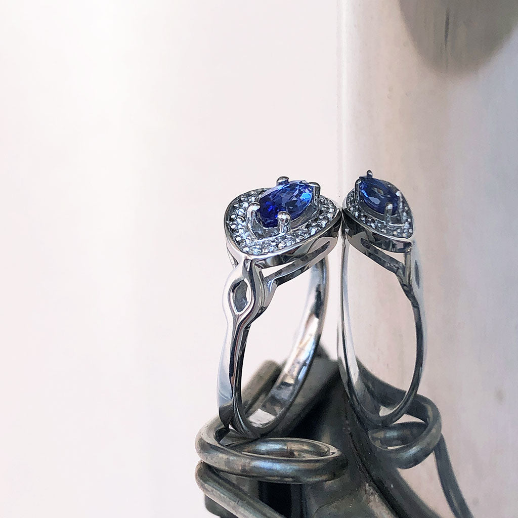 Marquise Cut tanzanite and Diamond Halo Ring