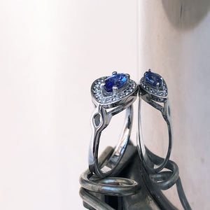 Marquise Cut tanzanite and Diamond Halo Ring