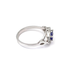 Marquise Cut tanzanite and Diamond Halo Ring