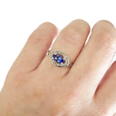 Marquise Cut tanzanite and Diamond Halo Ring