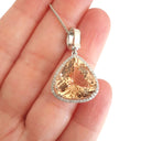 Modified Pear cut Morganite and Diamond Halo Pendant