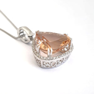 Modified Pear cut Morganite and Diamond Halo Pendant