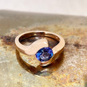 Molten Hot Round Cut Rose Gold Tanzanite Ring