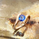 Molten Hot Round Cut Rose Gold Tanzanite Ring