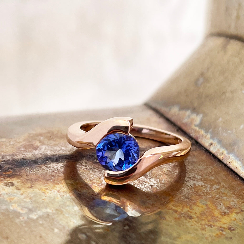 Molten Hot Round Cut Rose Gold Tanzanite Ring