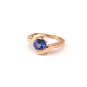 Molten Hot Round Cut Rose Gold Tanzanite Ring