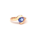 Molten Hot Round Cut Rose Gold Tanzanite Ring
