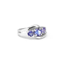 Ocean Wave Round Tanzanite Trilogy White Gold Ring