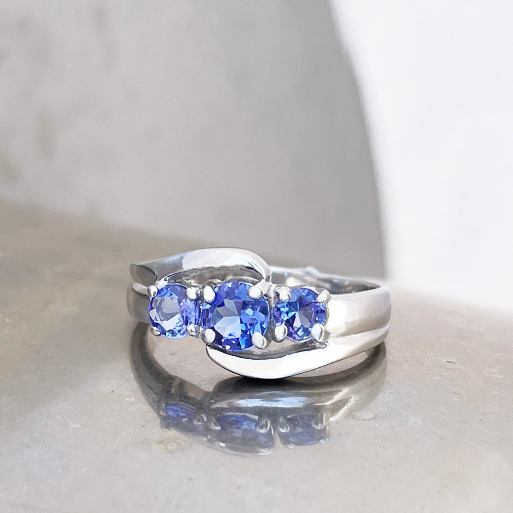 Ocean Wave Round Tanzanite Trilogy White Gold Ring