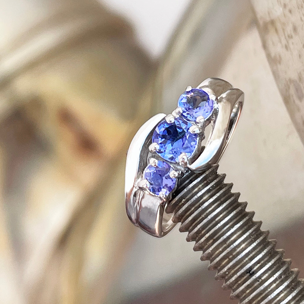 Ocean Wave Round Tanzanite Trilogy White Gold Ring