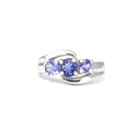 Ocean Wave Round Tanzanite Trilogy White Gold Ring
