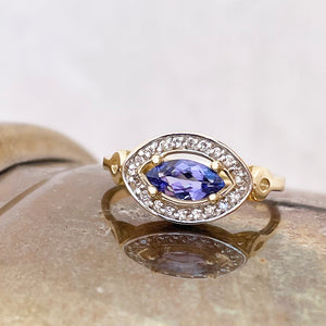 Opulent Marquise Tanzanite and Diamond Halo Yellow Gold Ring