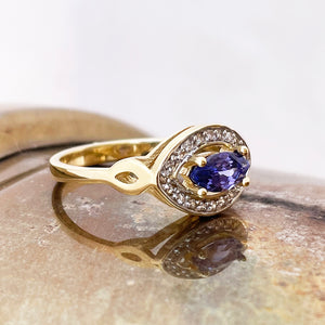 Opulent Marquise Tanzanite and Diamond Halo Yellow Gold Ring