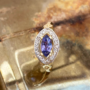 Opulent Marquise Tanzanite and Diamond Halo Yellow Gold Ring