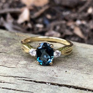 Oval-Cut London Blue Topaz Ring with Diamond Accents 