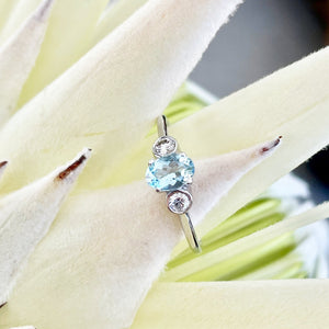 Oval Aquamarine and Double Bezel Diamond Highlight Ring