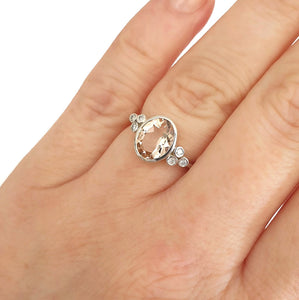  Oval Bezel Set Morganite Ring with Double Diamond Shoulder Trilogy Accents