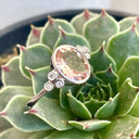 Oval Bezel Set Morganite Ring with Double Diamond Shoulder Trilogy Accents