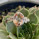 Oval Bezel Set Morganite Ring with Double Diamond Shoulder Trilogy Accents