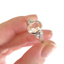  Oval Bezel Set Morganite Ring with Double Diamond Shoulder Trilogy Accents