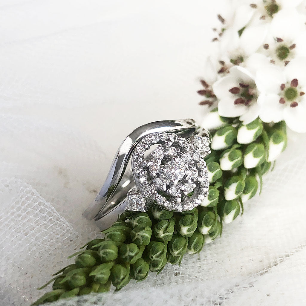 Oval Cluster and Diamond Shoulder Engagement Ring and White Gold Band Wedding Set