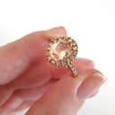 Oval Cut Morganite and Diamond Halo Ring
