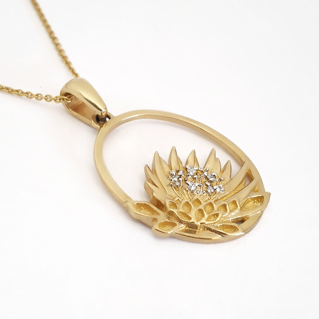 Oval Cut Out Protea Pendant with Diamonds