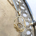 Oval Cut Out Protea Pendant with Diamonds