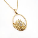 Oval Cut Out Protea Pendant with Diamonds