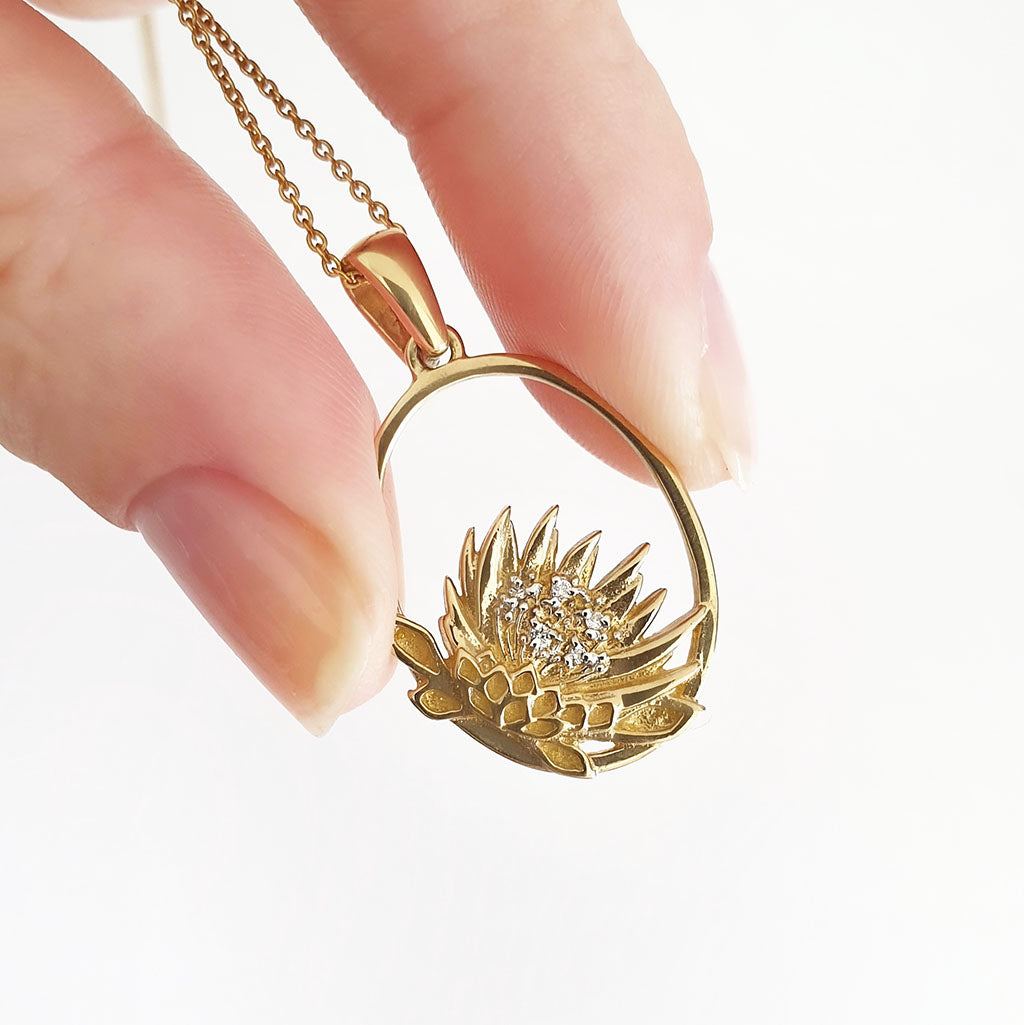 Oval Cut Out Protea Pendant with Diamonds