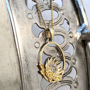 Oval Cut Out Protea Pendant with Diamonds
