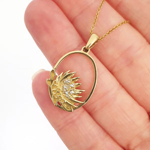 Oval Cut Out Protea Pendant with Diamonds