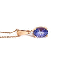 Oval Cut Tanzanite and Petite Diamond Highlight Pendant