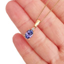 Oval Cut Tanzanite and Petite Diamond Highlight Pendant