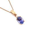 Oval Cut Tanzanite and Petite Diamond Highlight Pendant