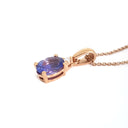Oval Cut Tanzanite and Petite Diamond Highlight Pendant