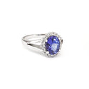 Oval Cut Tanzanite with Diamond Halo and Split Shoulder Ring