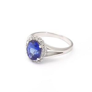 Oval Cut Tanzanite with Diamond Halo and Split Shoulder Ring