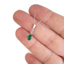 Oval Emerald and Double Diamond Pendant